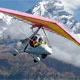 Ultra Light Flight Ultralight aircraft soaring over Pokhara with views of Phewa Lake and snow-capped peaks